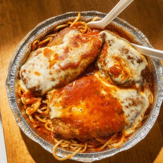 Chicken Parmigiana Over Spaghetti